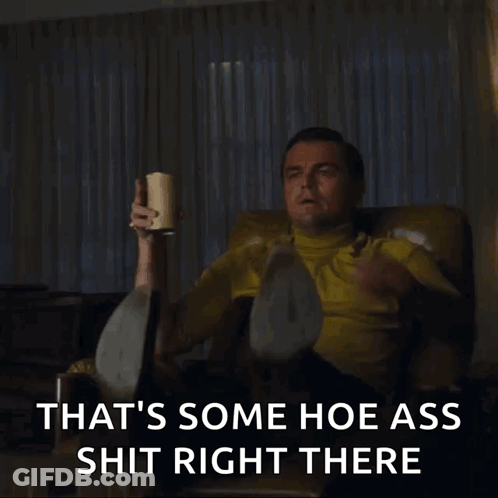 A Man In A Yellow Shirt Is Pointing At Something With The Words That 'S Some Hoe Ass Shit Right There GIF