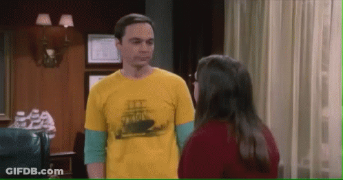 Man In Yellow Shirt Standing Next To Woman GIF