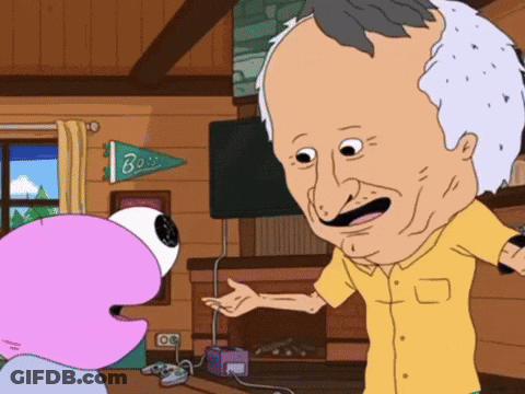 A Man In A Yellow Shirt Is Talking To A Cartoon Character In Front Of A Fireplace With A Banner That Says Boss GIF