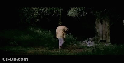 A Man In A Yellow Shirt Is Walking Through A Dark Forest With The Words " It 'S Those Damn Enchiladas " Above Him GIF