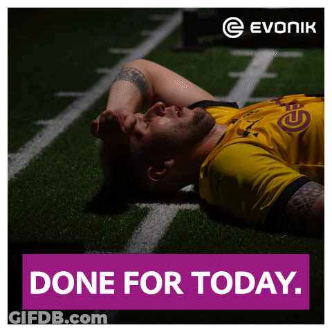 A Man In A Yellow Shirt Laying On A Soccer Field With The Words Done For Today Below Him GIF