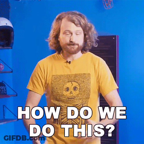 A Man In A Yellow Shirt With A Skull On It Says How Do We Do This GIF
