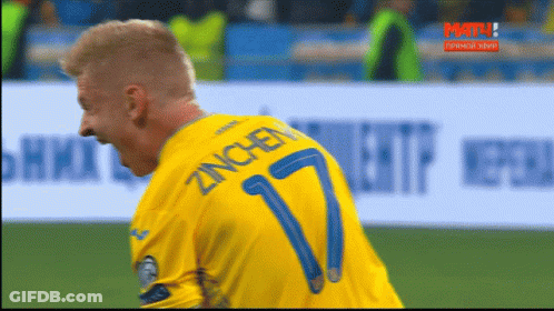 A Man In A Yellow Shirt With The Number 7 On The Back GIF