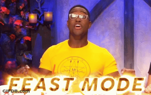 A Man In A Yellow Shirt With The Word Feast Mode Written On It GIF