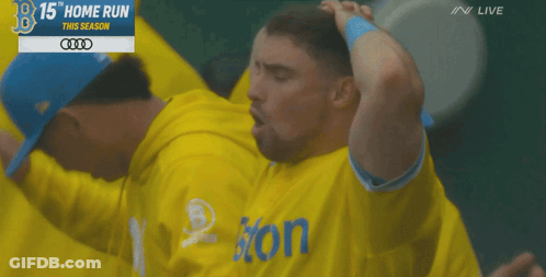 A Man In A Yellow Shirt With The Word Ion On It GIF