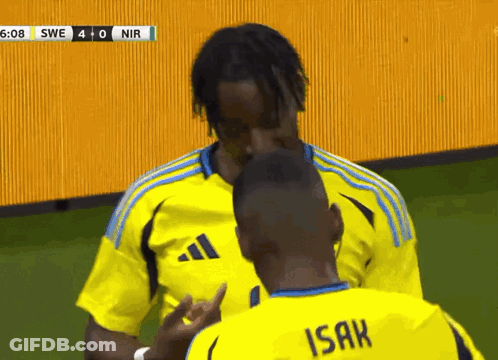 A Man In A Yellow Shirt With The Word Isak On It GIF