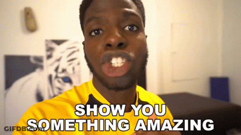 A Man In A Yellow Shirt With The Words Show You Something Amazing Behind Him GIF