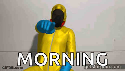 A Man In A Yellow Suit And Blue Gloves Points To The Word Morning GIF