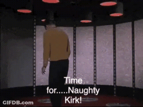 A Man In A Yellow Sweater Is Standing In A Room And Says " Time For Naughty Kirk " GIF