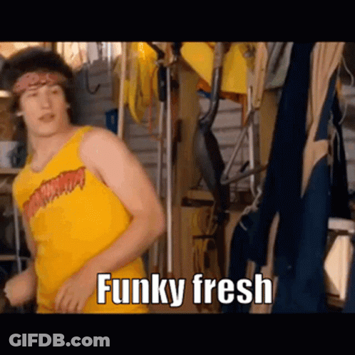 A Man In A Yellow Tank Top Is Dancing In A Garage With The Words `` Funky Fresh '' Written Below Him . GIF