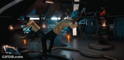 A Man In A Yellow Uniform Has A Badge On His Chest That Says " Captain " GIF