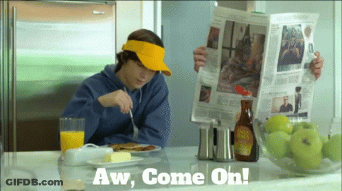 A Man In A Yellow Visor Is Reading A Newspaper And Saying Aw Come Oh GIF