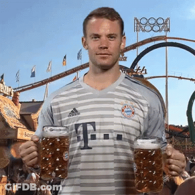 A Man In An Adidas Shirt Holds Two Beer Mugs GIF