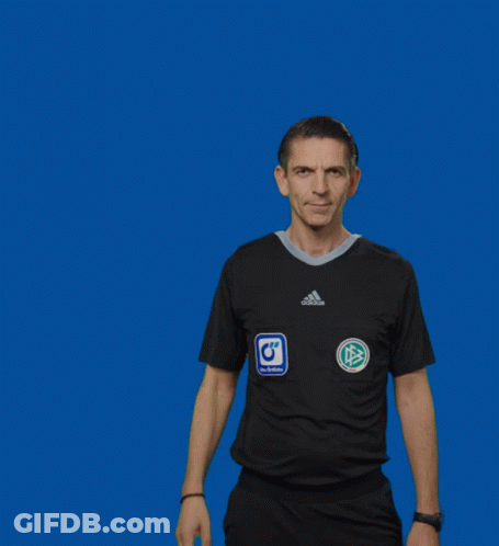 A Man In An Adidas Shirt Holds Up A Yellow Card Against A Blue Background GIF