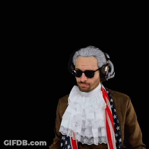 A Man In An American Flag Costume Is Pointing His Finger At The Word Blocked GIF