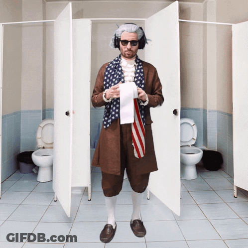 A Man In An American Flag Costume Is Standing In A Bathroom Holding A Roll Of Toilet Paper GIF
