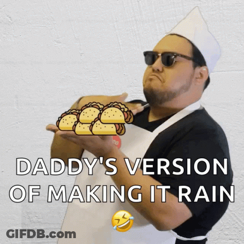 A Man In An Apron Is Holding A Bunch Of Tacos And The Caption Says Daddy 'S Version Of Making It Rain GIF