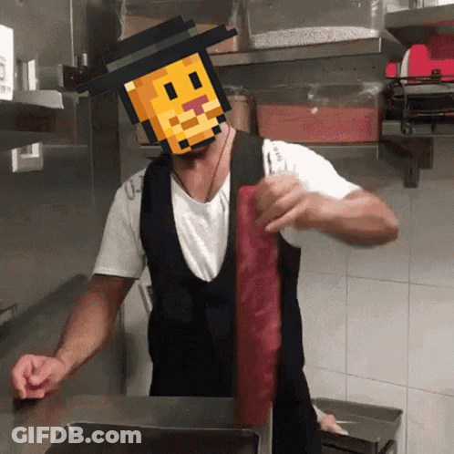 Man In Apron Holding Meat GIF