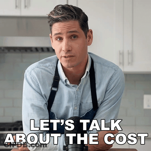 A Man In An Apron With The Words Let 'S Talk About The Cost Behind Him GIF
