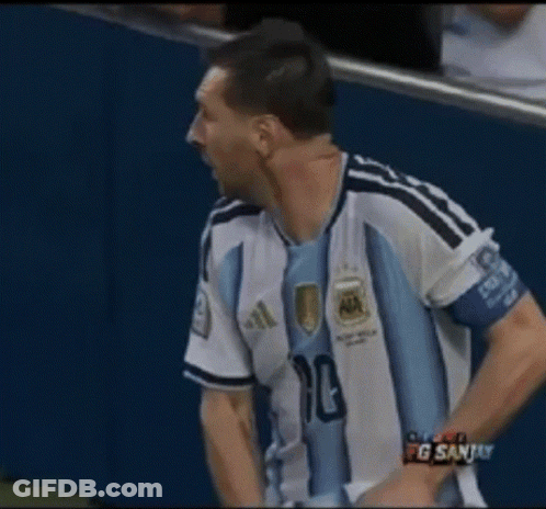 A Man In An Argentina Jersey Holds A Stack Of Money In His Hands GIF