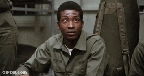 A Man In An Army Uniform Has The Name Robinson On His Chest GIF