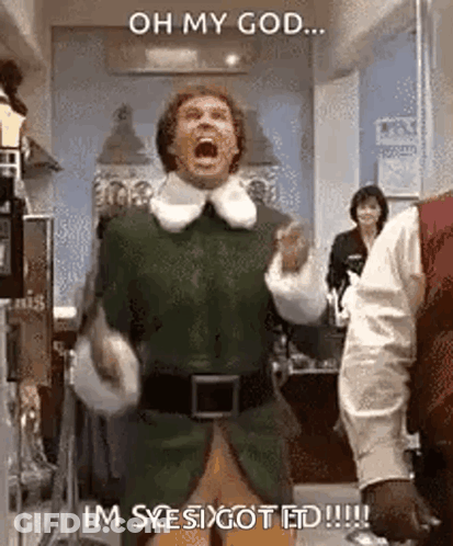 A Man In An Elf Costume Is Screaming In A Room . GIF