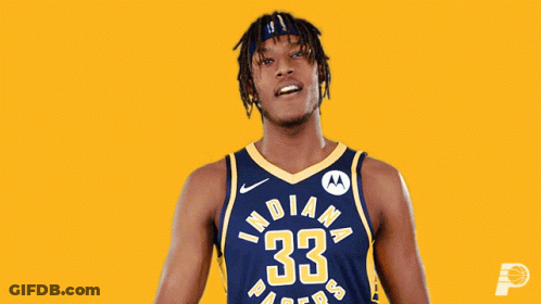 A Man In An Indiana Pacers Jersey Flexing His Muscles GIF