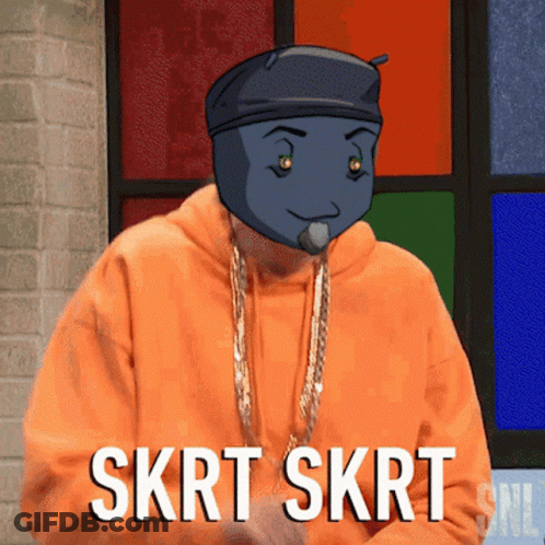 A Man In An Orange Hoodie Says Skrt Skrt In Front Of A Stained Glass Window GIF