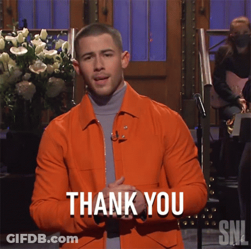 A Man In An Orange Jacket Says Thank You On Snl GIF