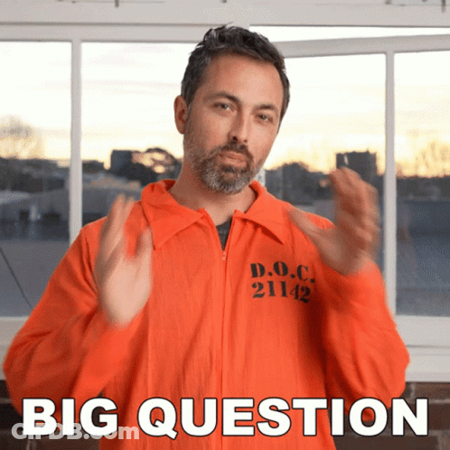 A Man In An Orange Jumpsuit With The Number 21142 On It GIF