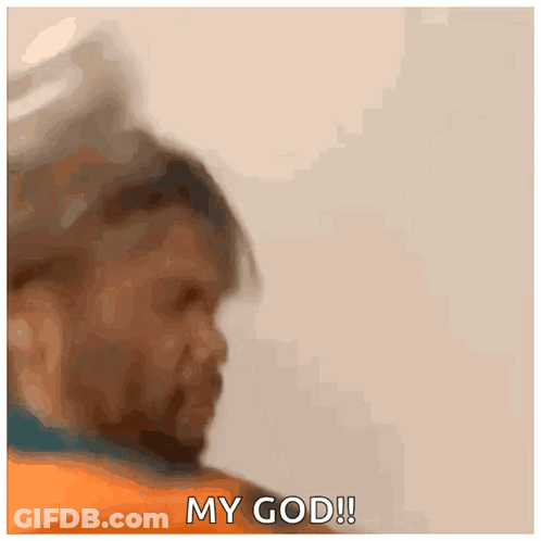 A Man In An Orange Shirt Is Saying My God ! GIF