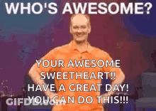 A Man In An Orange Shirt Is Standing On A Stage With His Hands On His Hips And Says `` Who 'S Awesome ? '' GIF