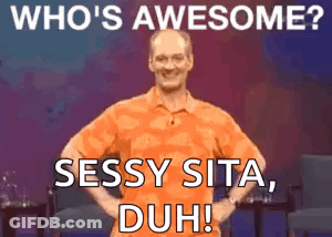 A Man In An Orange Shirt Is Standing With His Hands On His Hips And Says Who 'S Awesome ? Sassy Sita Duh ! GIF