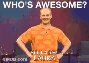 A Man In An Orange Shirt Is Standing With His Hands On His Hips And Says Who 'S Awesome ? You Are ! GIF