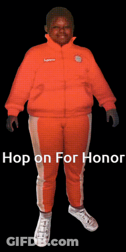 A Man In An Orange Supreme Jacket And Pants Is Standing In Front Of A Black Background GIF