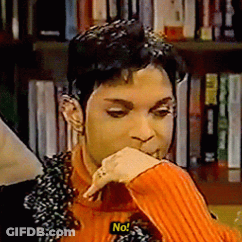A Man In An Orange Sweater Says No In A Yellow Sticker GIF