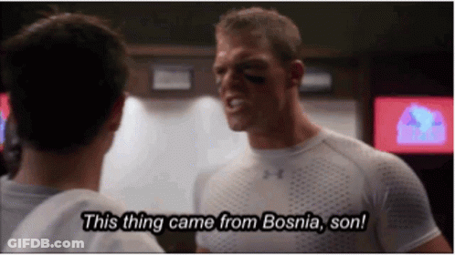 A Man In An Under Armour Shirt Talks To Another Man In A Locker Room And Says This Thing Came From Bosnia Son GIF