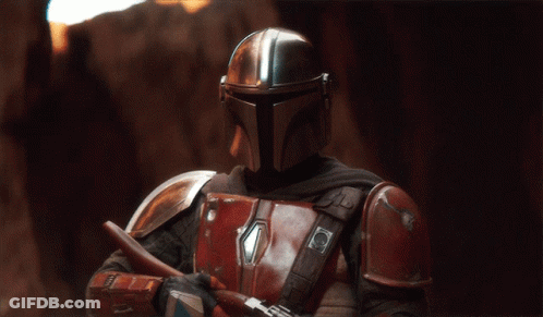 A Man In Armor Has A Badge On His Chest That Says ' A ' GIF