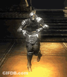A Man In Armor Is Dancing In A Dark Room GIF