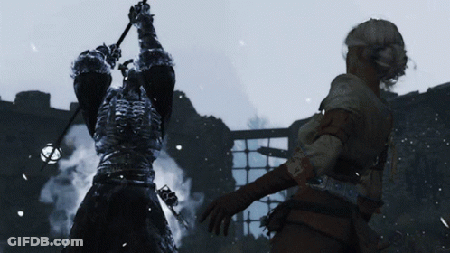 A Man In Armor Is Holding A Sword Above His Head While A Woman Stands Behind Him GIF