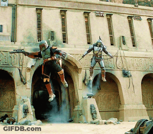 A Man In Armor Is Jumping In The Air In Front Of A Building That Says ' Sd ' On It GIF