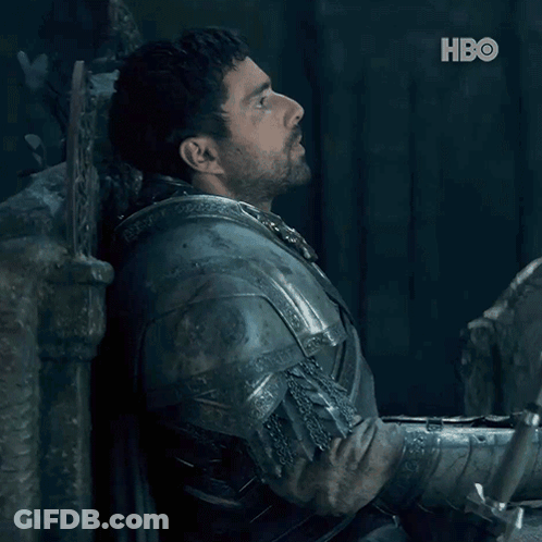 A Man In Armor Is Leaning Against A Wall And The Word No Is On The Bottom GIF