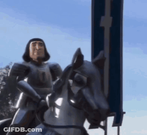 A Man In Armor Is Riding A Horse GIF
