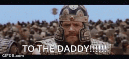 A Man In Armor Is Standing In Front Of A Crowd And Says To The Daddy GIF