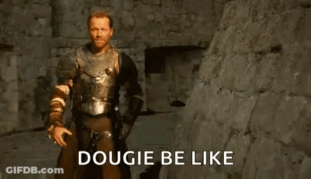 A Man In Armor Is Standing In Front Of A Stone Wall And Saying `` Doogie Be Like '' . GIF