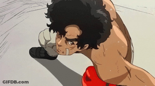 A Man In Boxing Gloves Is Kneeling Down GIF