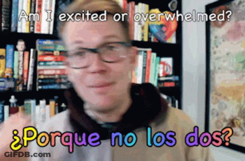 A Man In Front Of A Bookshelf With The Words Am I Excited Or Overwhelmed Porque No Los Dos GIF