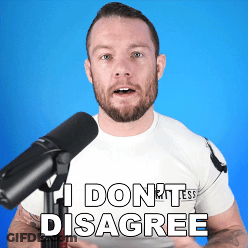 A Man In Front Of A Microphone Says I Don T Disagree GIF