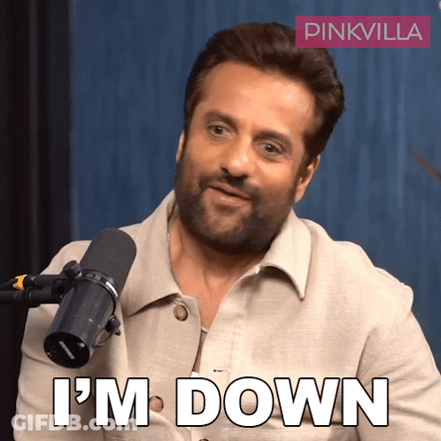 A Man In Front Of A Microphone With The Words I 'M Down On His Face GIF