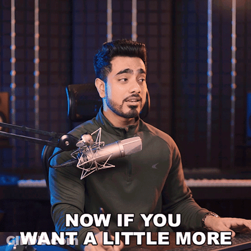 A Man In Front Of A Microphone With The Words Now If You Want A Little More Below Him GIF